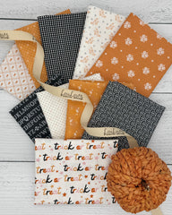 Collection of 10 cream, orange and black Halloween fat quarters