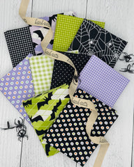 Collection of black, purple and green Halloween fabrics