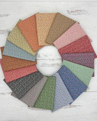 A variety of small floral prints in a muted color pallet. 