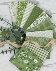 10 Fat quarters in fresh spring greens and off whites with floral, geometric and gingham prints. 