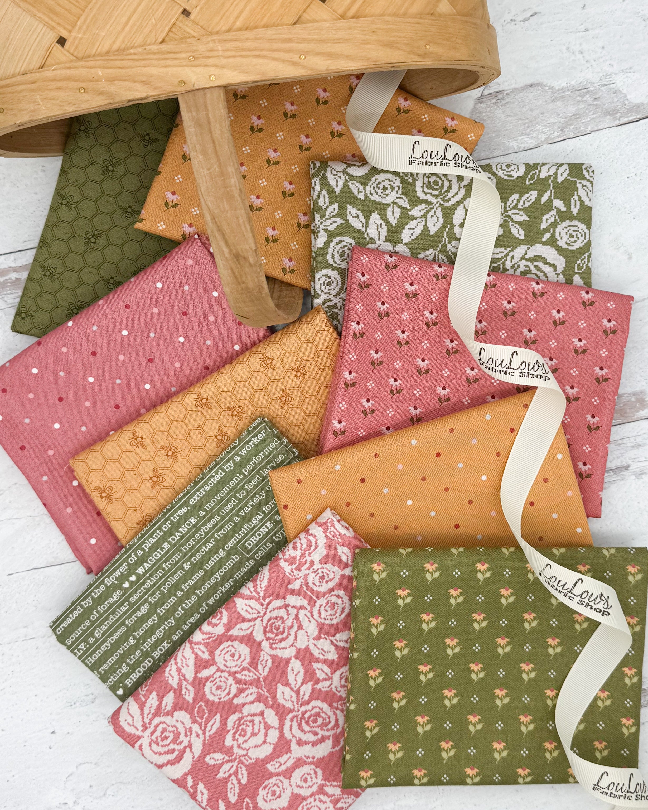 10 fat quarters in rosy pinks, honey golds and olive greens. Floral, dot and bee prints. 